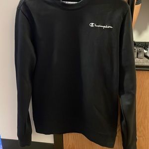 I am selling a black champion crew neck.